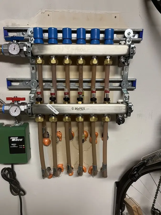 Plumber performing Water Heater Repair at a residential property in New Port Richey East